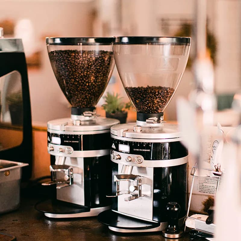 Dueling espresso grinders for regular and decaf